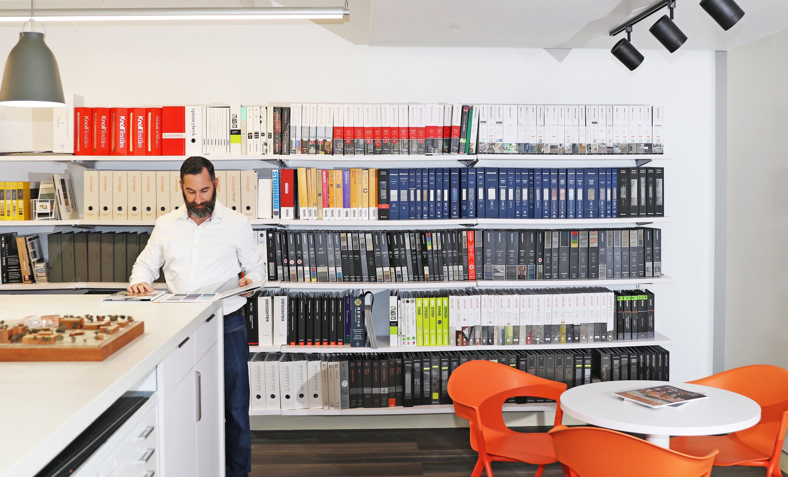 Interior common area with shelves of design books