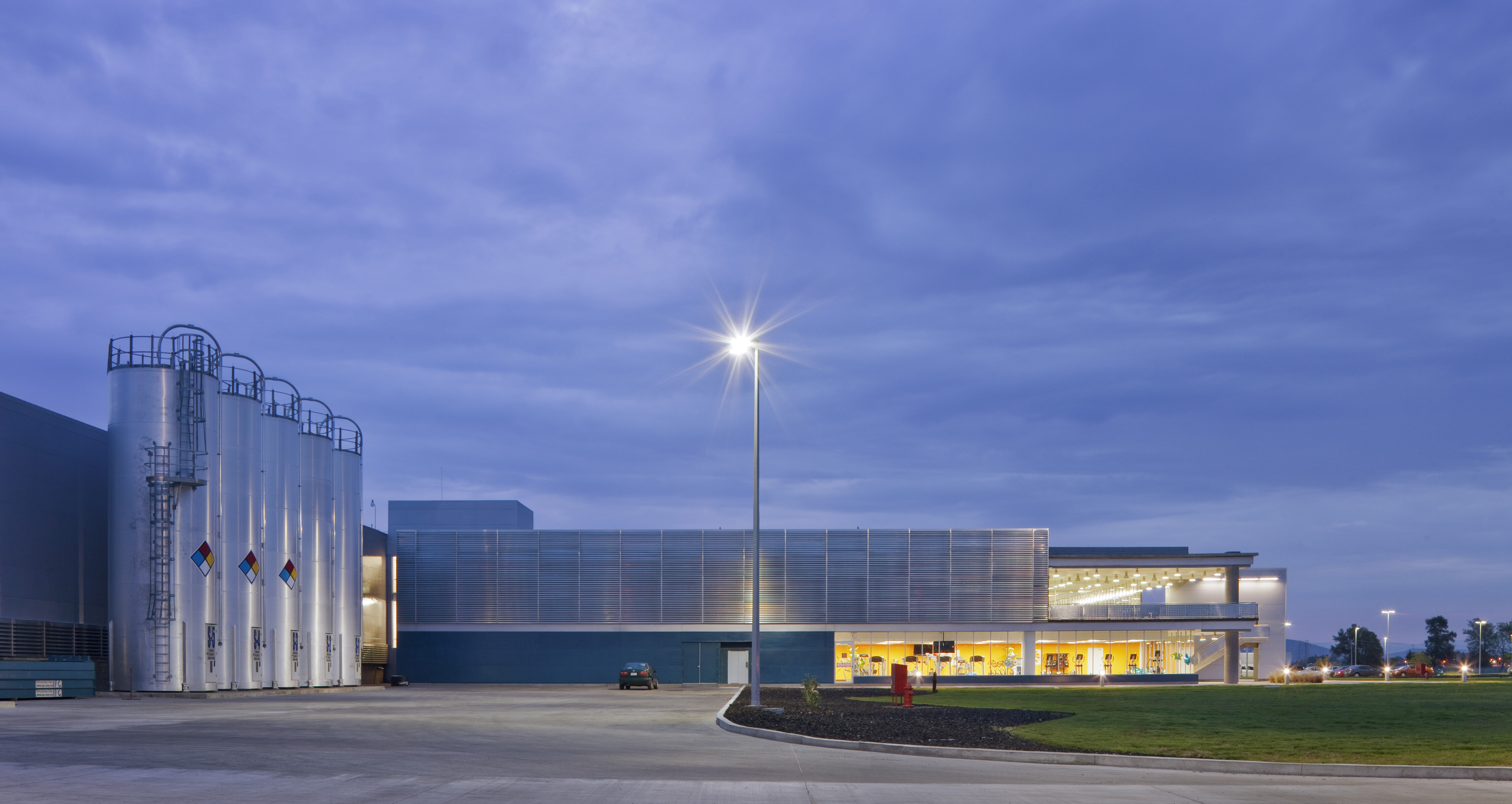 Gillette PM Photo EXT Admin Building with Tanks Dusk PR